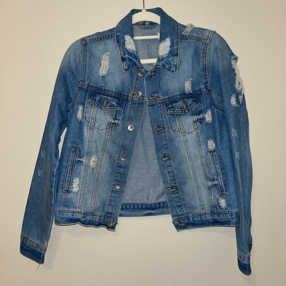 Distressed denim jacket